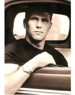  MALE LOOKING OUT CAR WINDOW