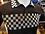 Chuxx CHUXX BLACK POLO WITH CHECKERBOARD COLLAR