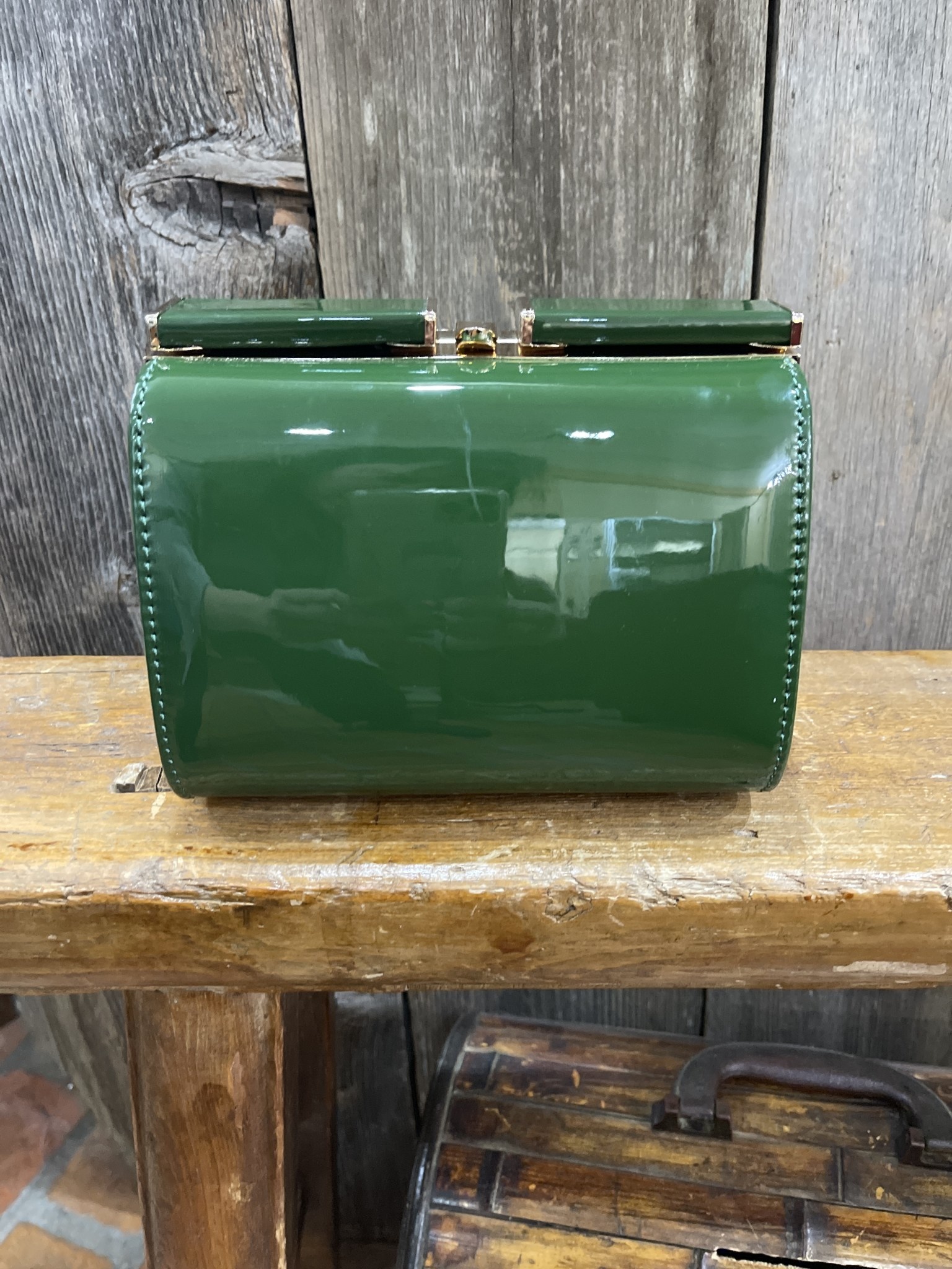 green patent leather purse