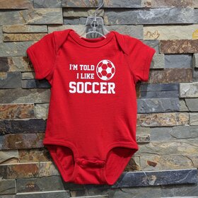 Red I'm Told I Like Soccer Onesie