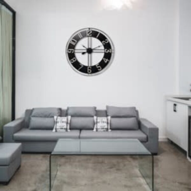 Horloge en métal ajouré 35 3/4" d