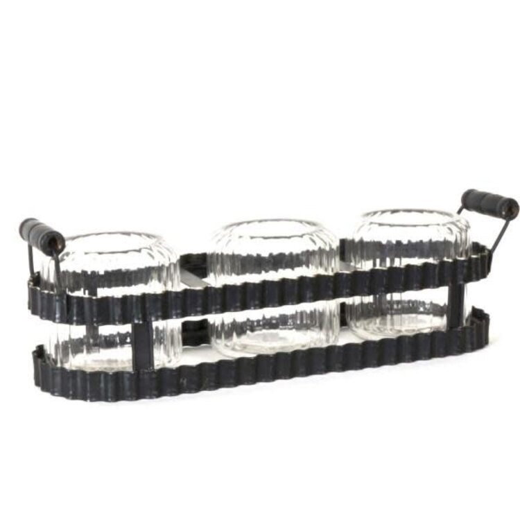 Bougeoir en verre sur plateau en métal