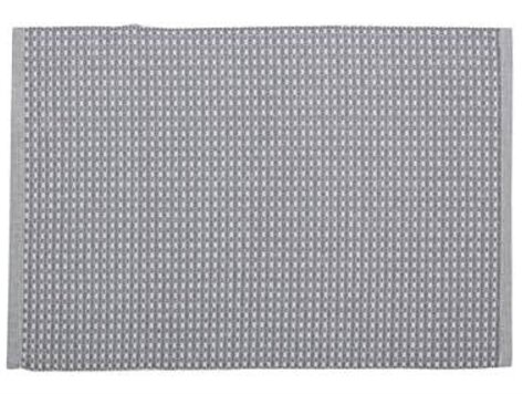 Napperon à motifs blancs et gris