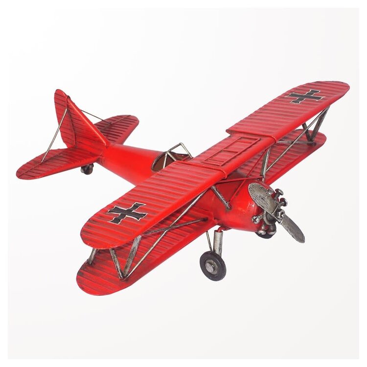 Avion en métal rouge