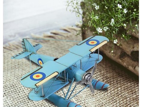 Avion bleu en métal