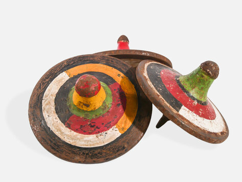 Toupie antique en métal