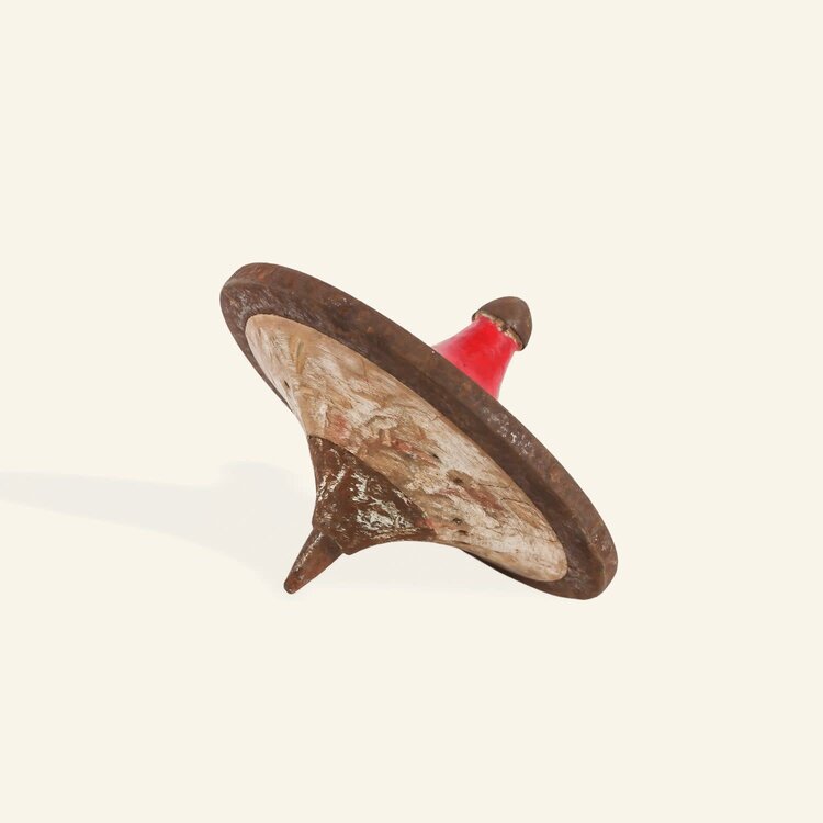 Toupie antique en métal