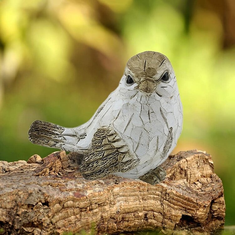 Oiseau blanc sculpté