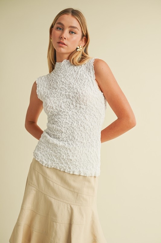 [eessay] MOUSSE MOCK NECK TOP /追跡付 MOCKNECK LIGHT RIB CROPPED TOP - courrèges (クレージュ)