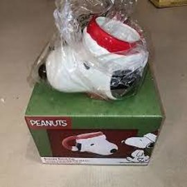 https://cdn.shoplightspeed.com/shops/637039/files/46546692/270x270x2/rocket-fizz-lancasters-peanuts-snoopy-santa-hat-sc.jpg