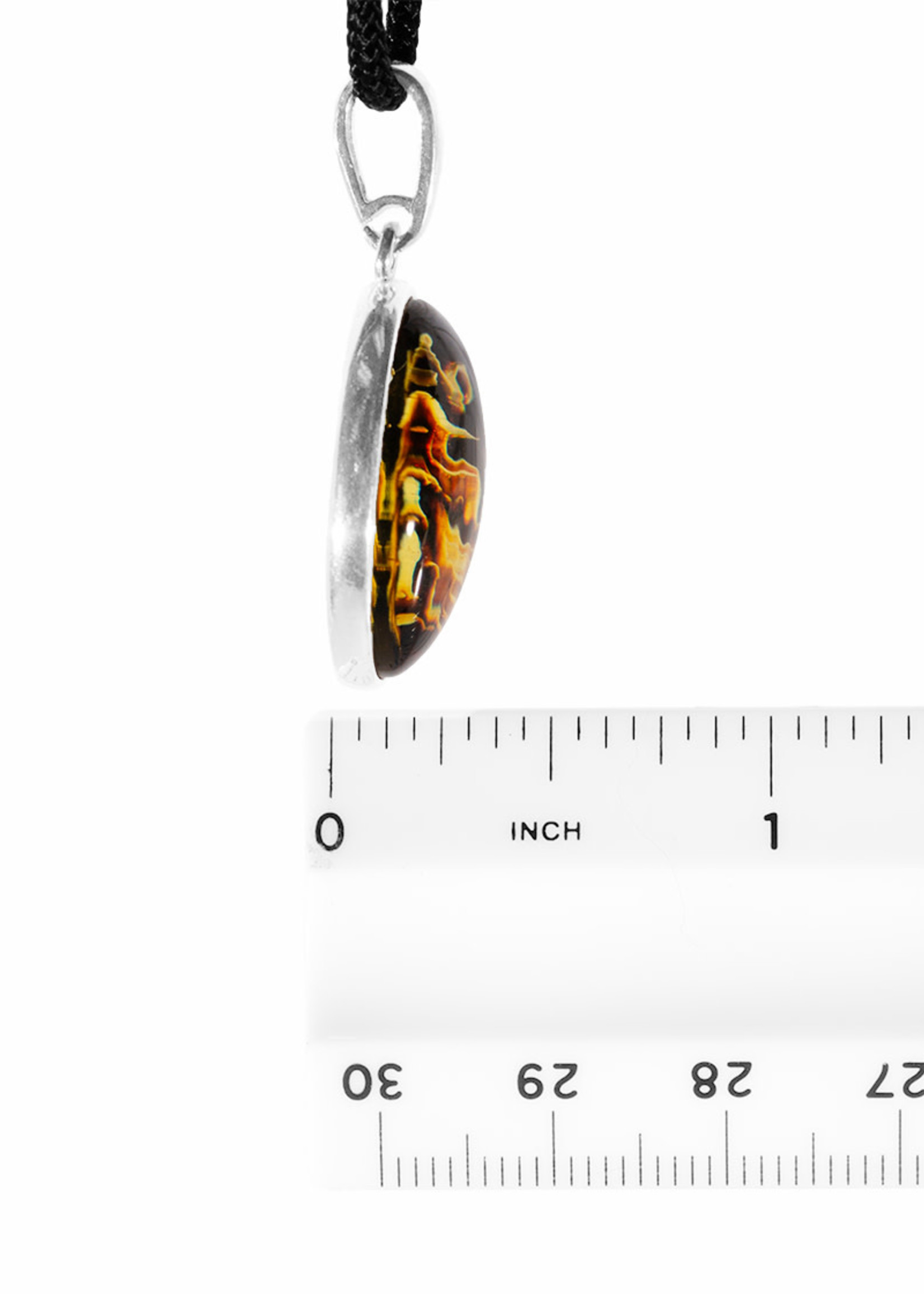 Minerals & Mystics Carved Amber Pendant