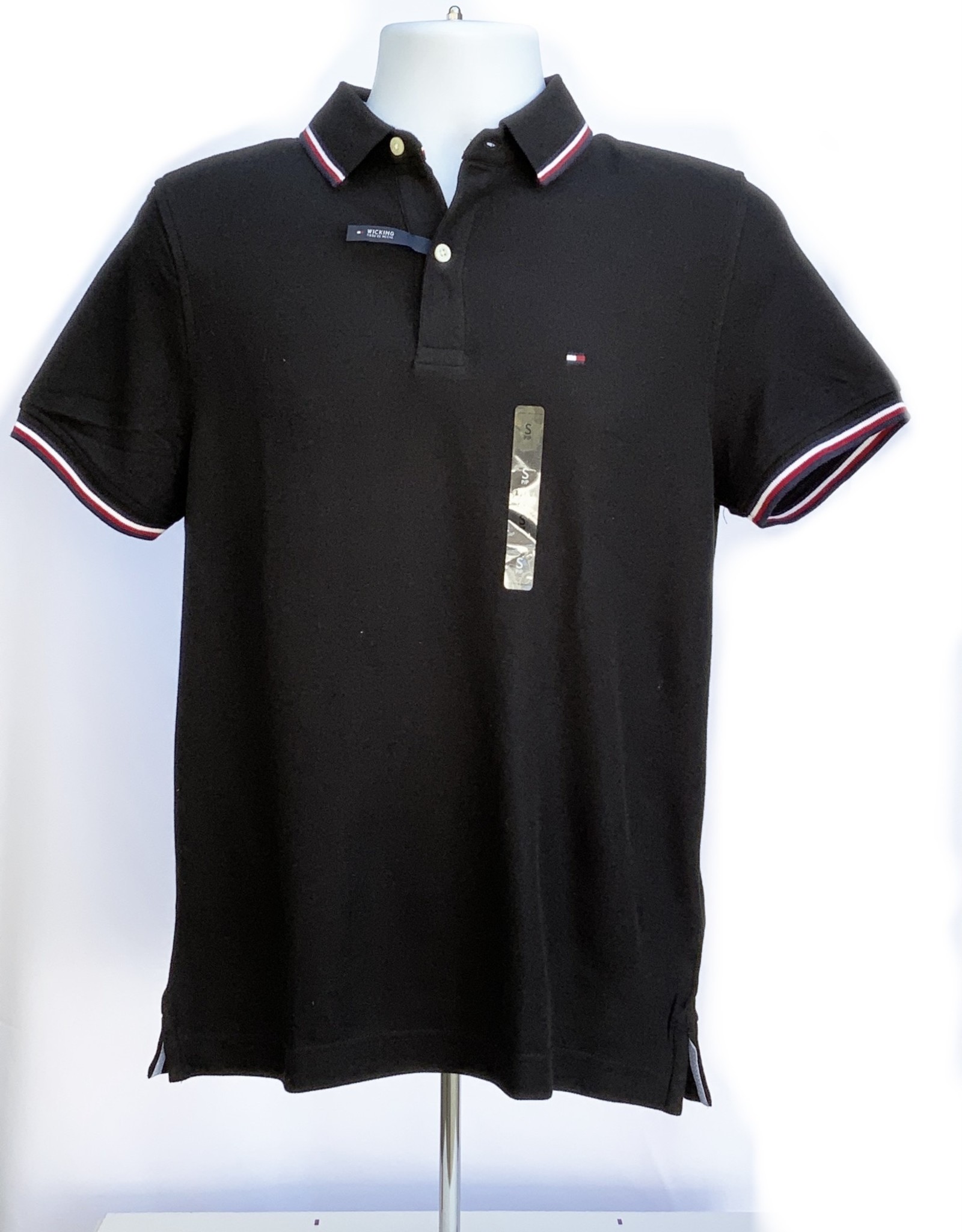 https://cdn.shoplightspeed.com/shops/637078/files/32356231/1600x2048x1/tommy-hilfiger-tommy-hilfiger-polo-shirt-solid-wic.jpg