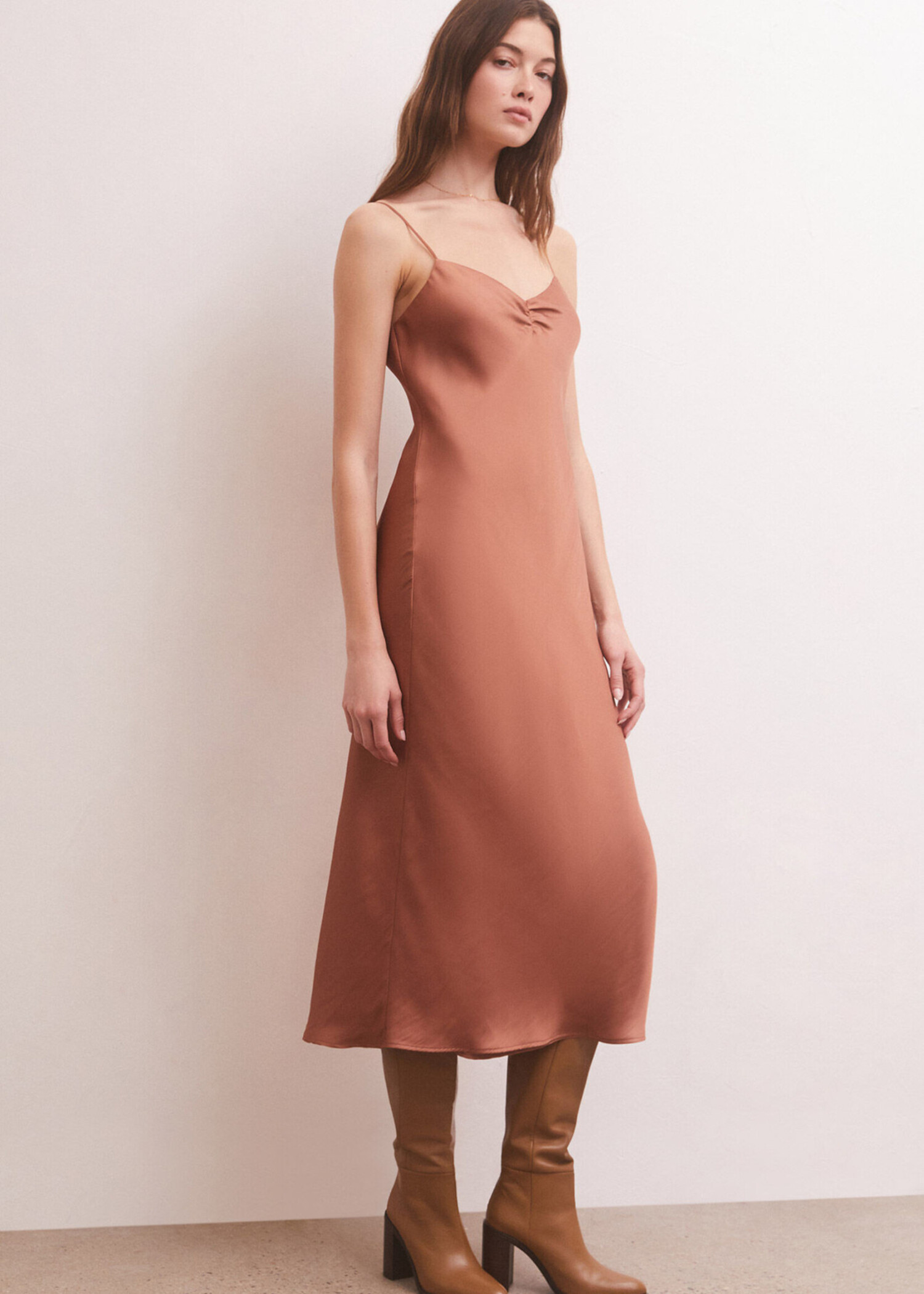 https://cdn.shoplightspeed.com/shops/637120/files/57319336/1500x4000x3/zsupply-lark-lux-sheen-slip-dress-penny.jpg