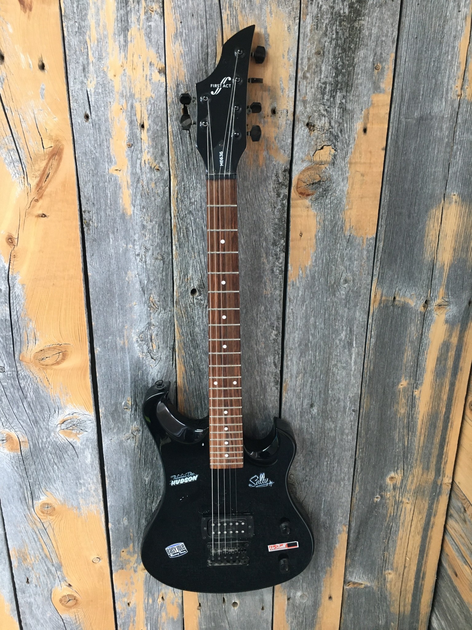 first act black electric guitar