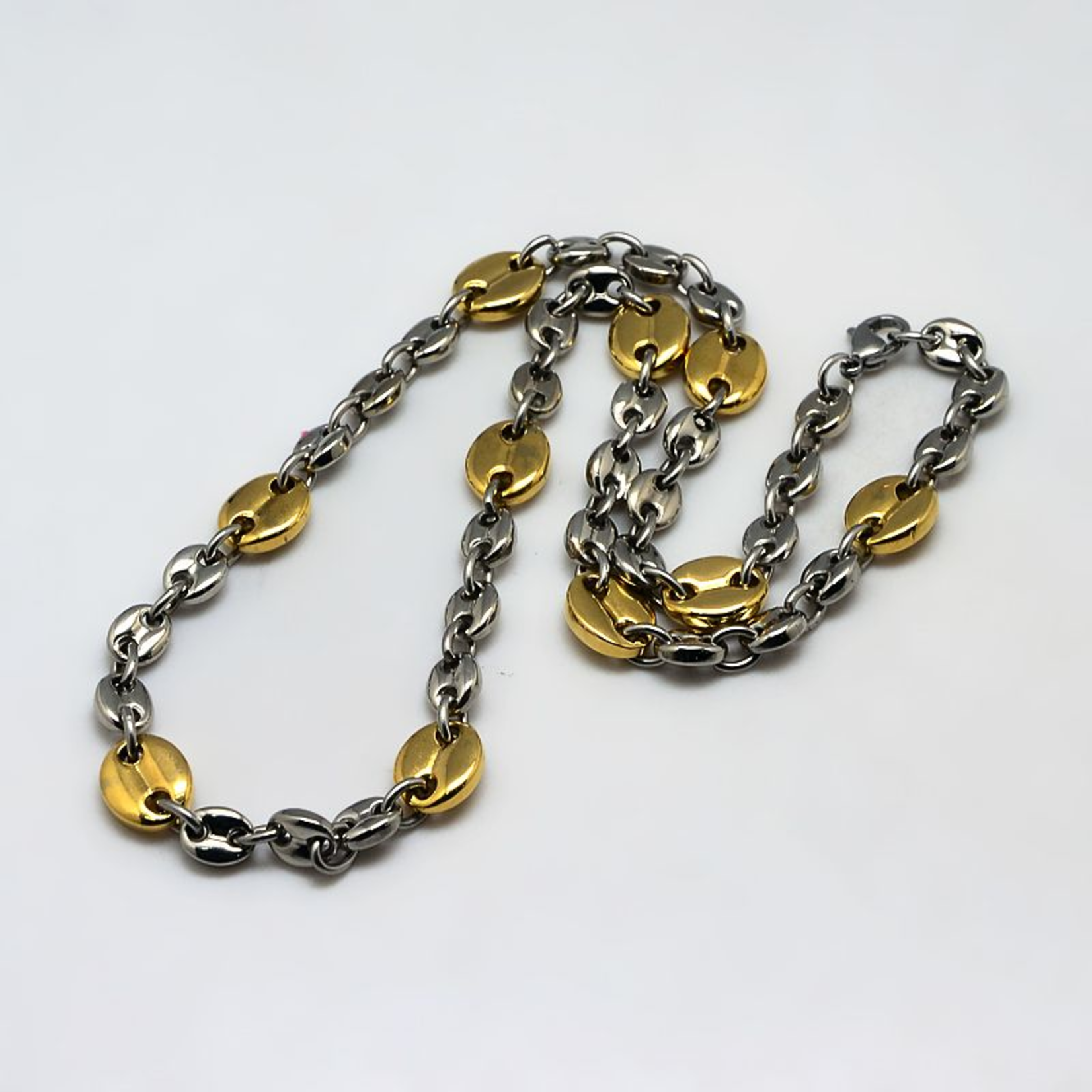 https://cdn.shoplightspeed.com/shops/637273/files/26558045/1652x1652x2/fashion-jewelry-mixed-stainless-coffee-bean-chain.jpg