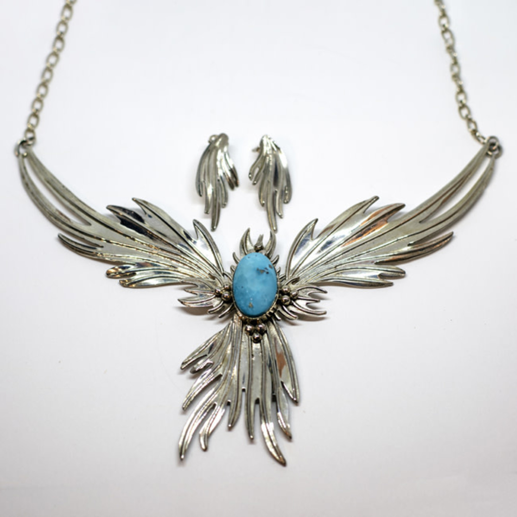 Necklace pendant: artistic phoenix, silver