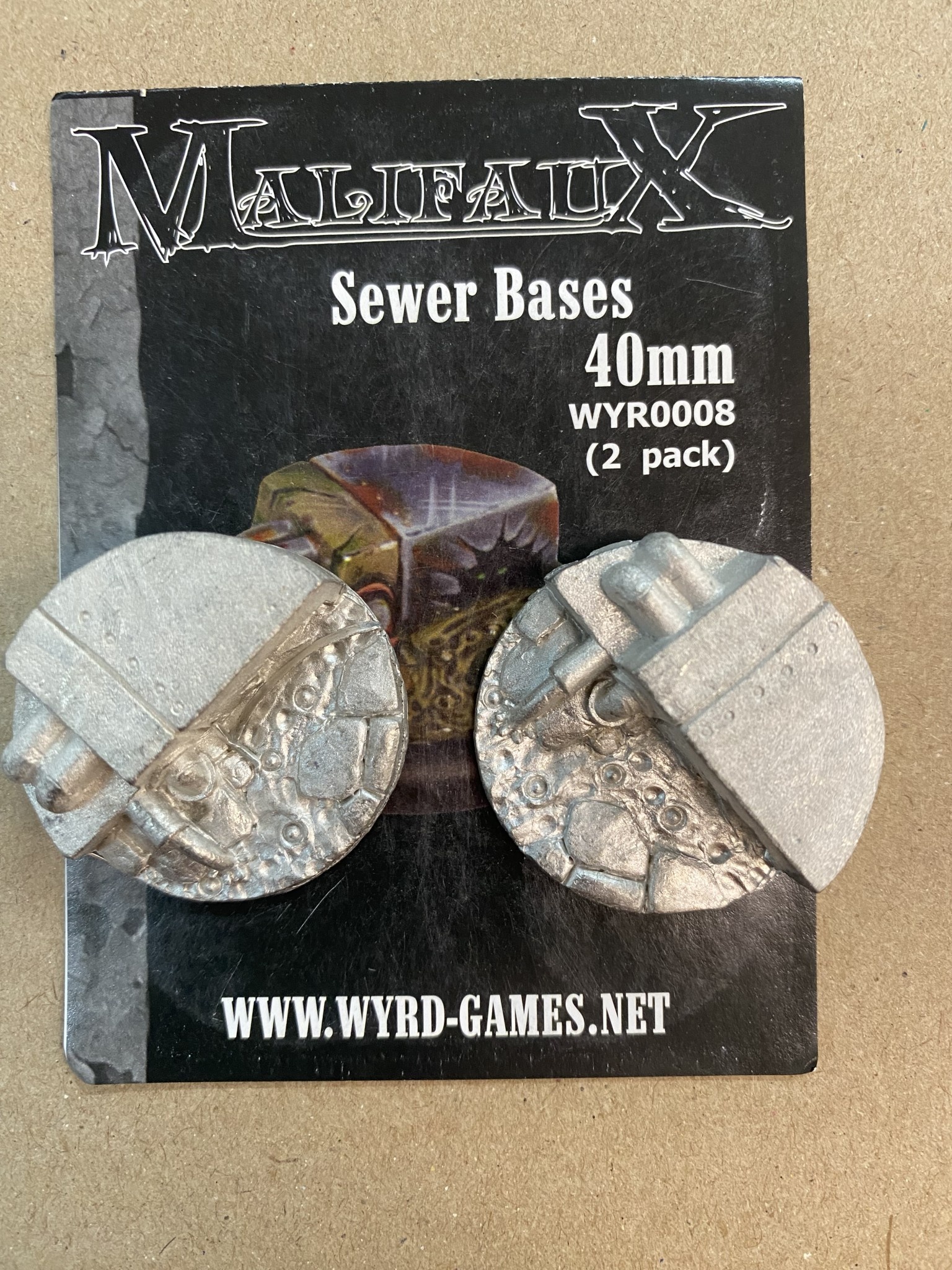 MALIFAUX Sewer Bases, 40MM (QTY 2), Wyrd Games