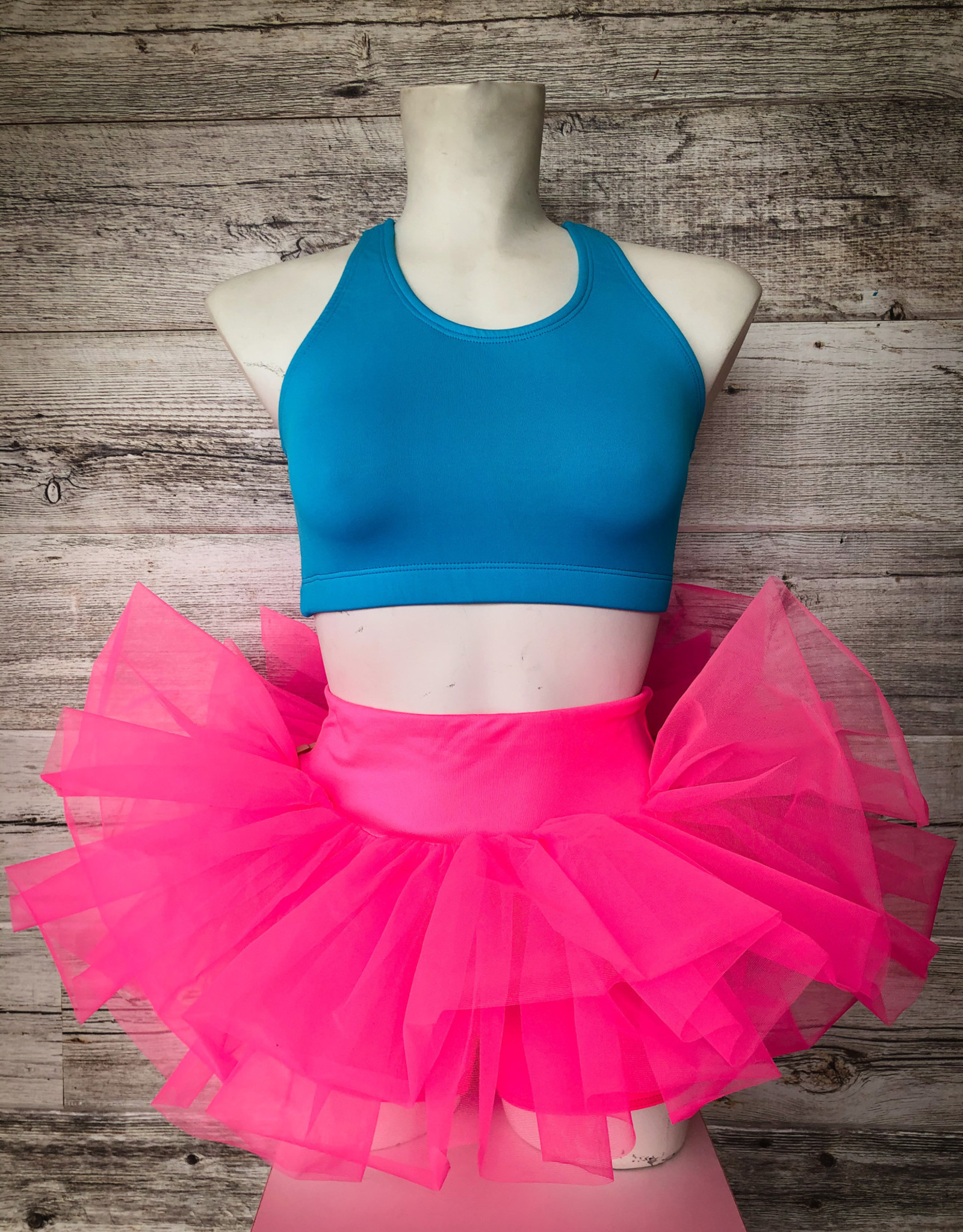 https://cdn.shoplightspeed.com/shops/637298/files/25999371/1600x2048x1/tutu-rose-neon-avec-short-integre-sa.jpg