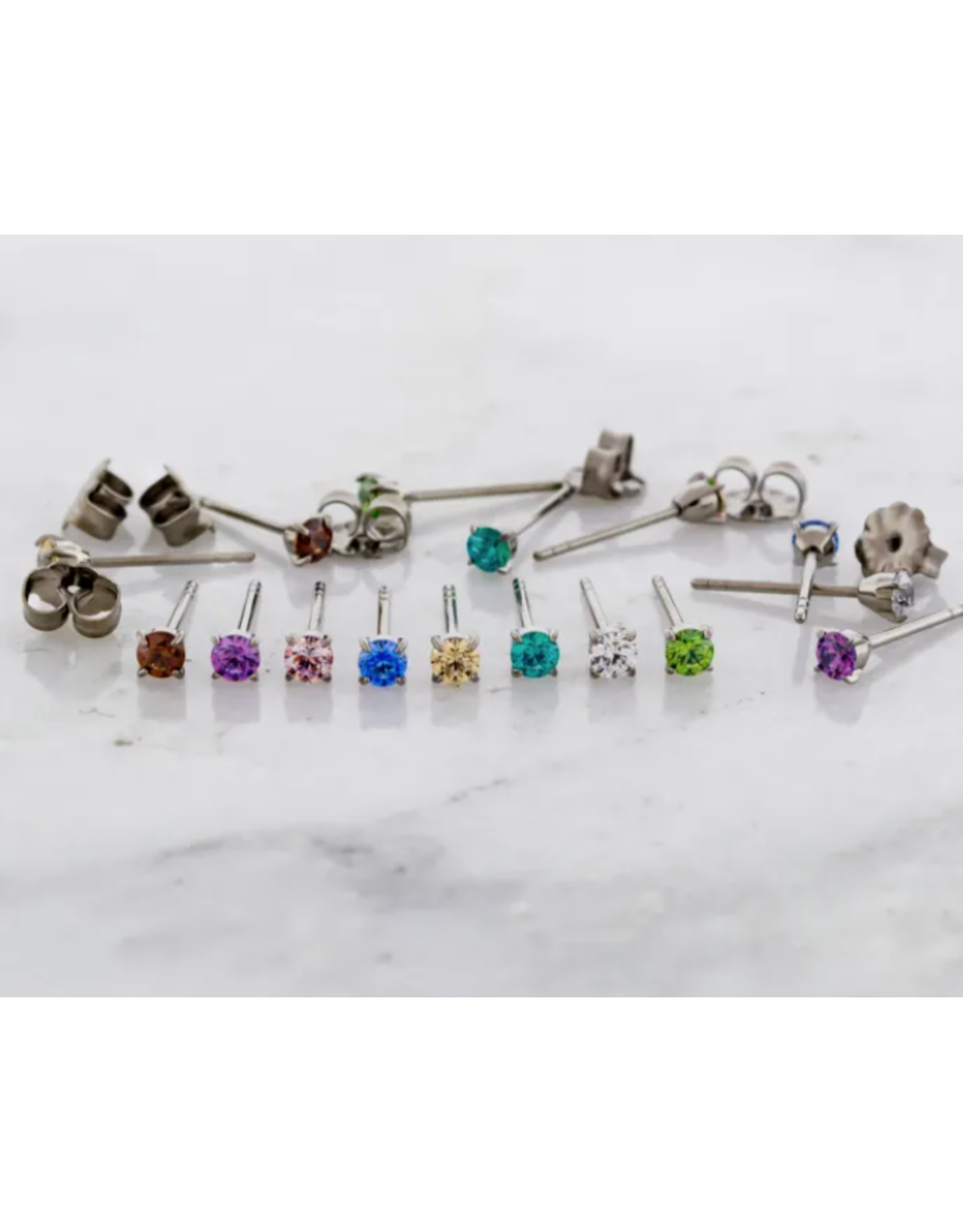 Boucle d'oreille à Papillon Griffée Titanium