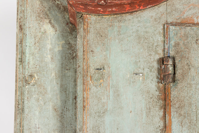Circa 19th century Swedish painted cabinet that features an "1800" carving on the front