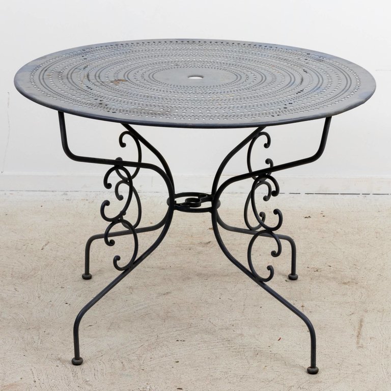 French wrought iron garden table and four chairs