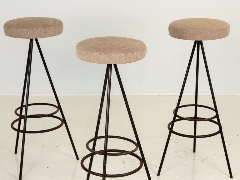Set of four iron base bar stools