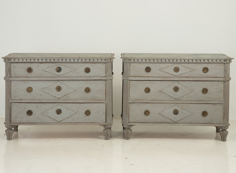 Pair of Gustavian Style Chests of Drawers with dentil moulding and lozenge design on three drawers