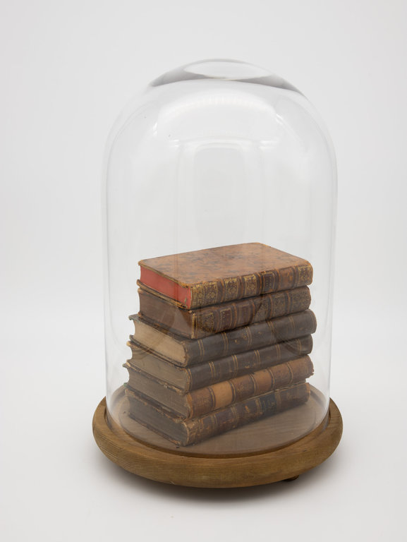 Collection of Bound Books Under Glass Cloche with Base