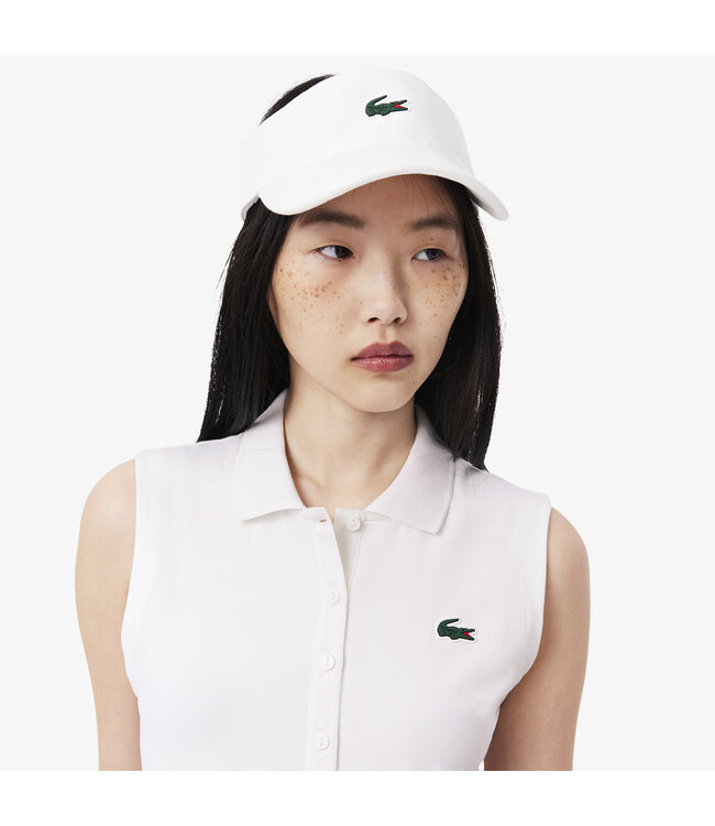 Lacoste Polo de golf extensible coupe slim avec protection UV PF7414-52 001 BLANC