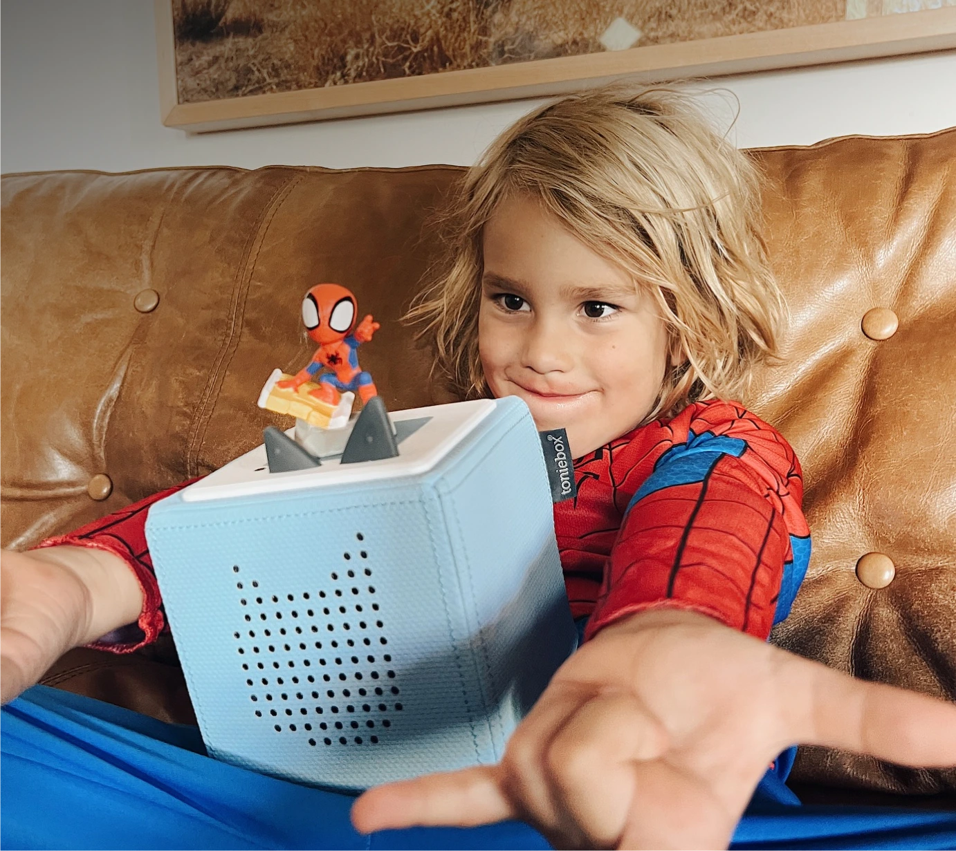 Child with Toniebox audio player