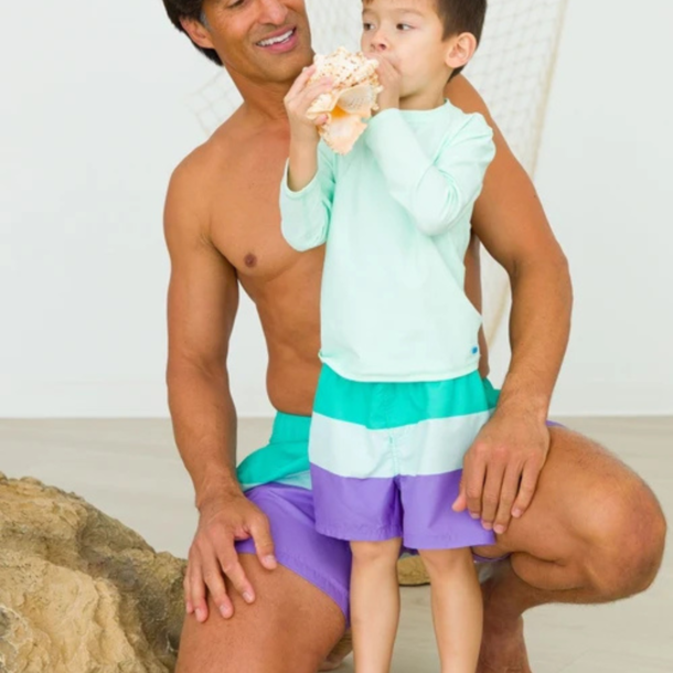 Rufflebutts Ruggedbutts: Swim Trunks - Green Purple Colorblock