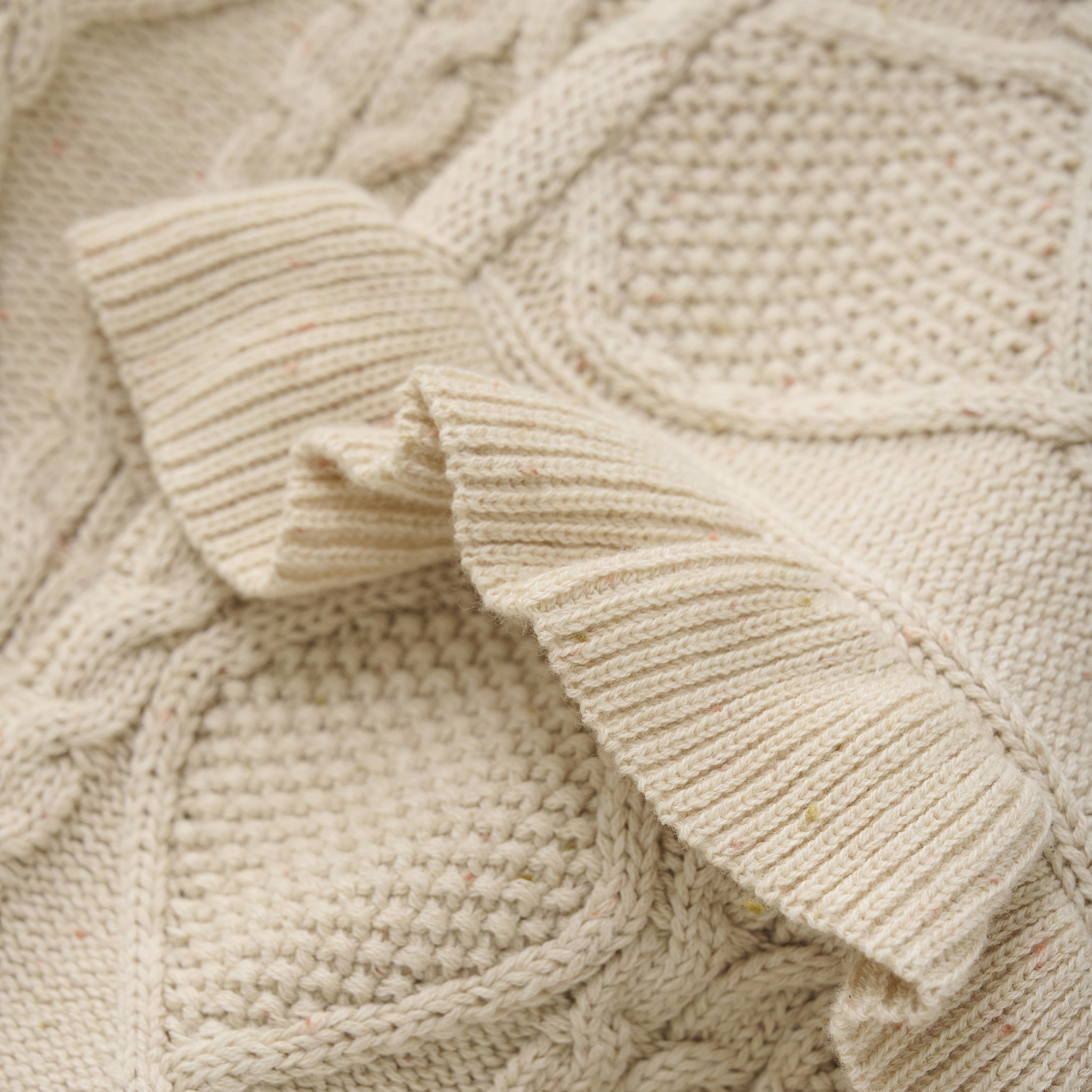 KNITTED SWEATER NAPPY