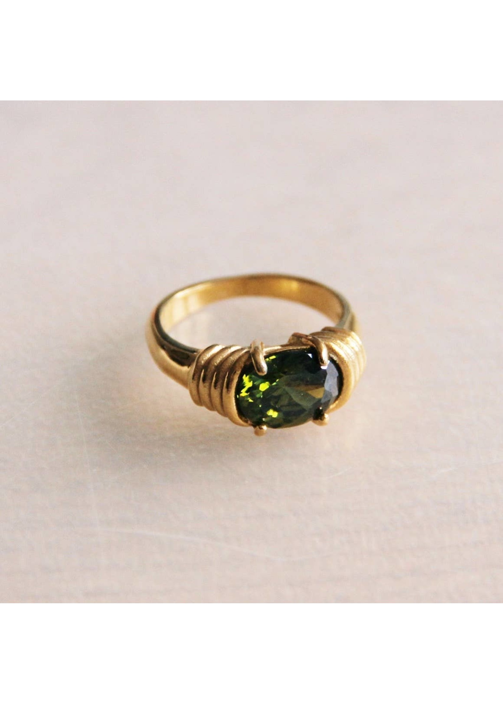 Steel ring with zirconia green stone
