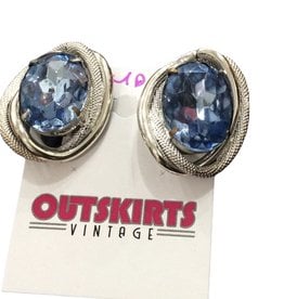 Large blue stone in silver setting clip earring