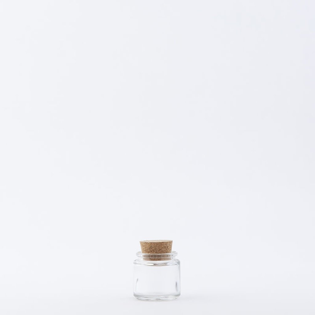 • 1 oz Glass Jar / Cork Top