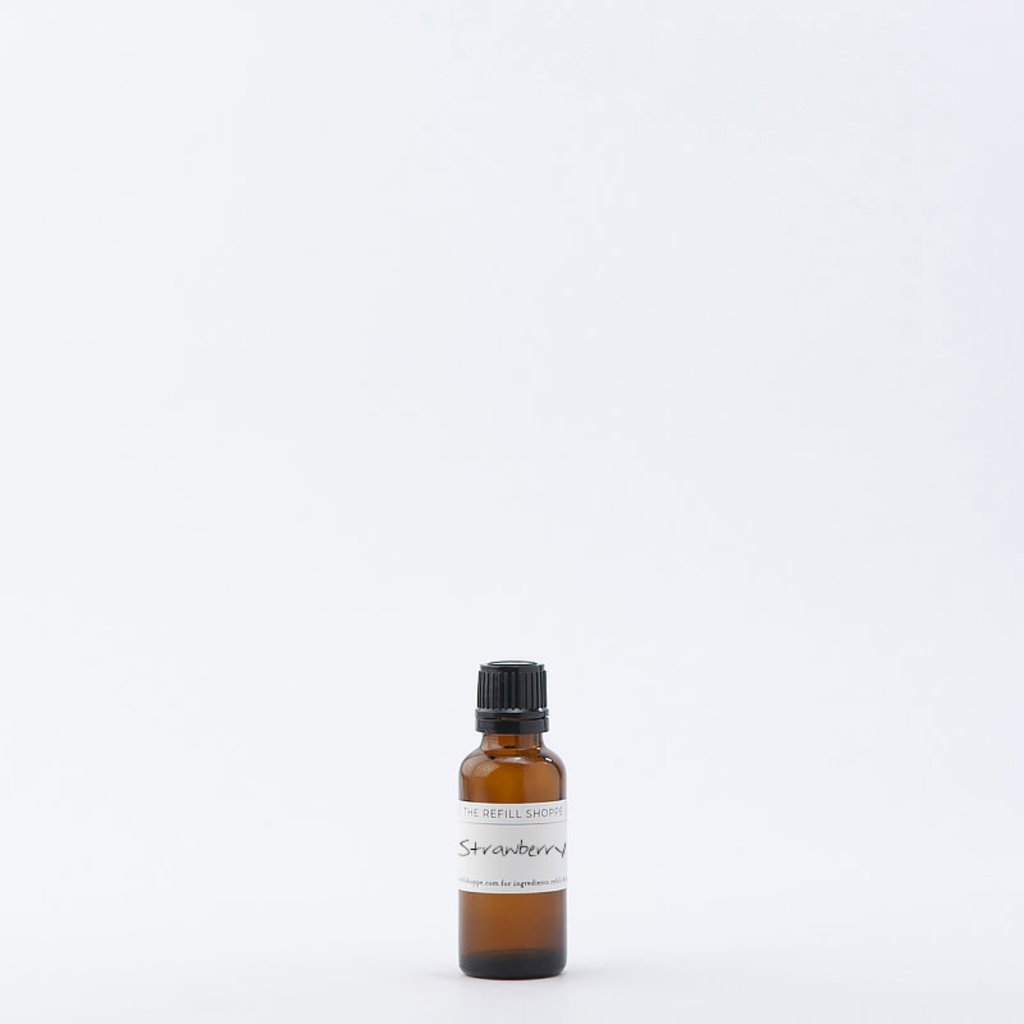 Bottle with Perfume from Strawberry Essential Oil on a Wooden