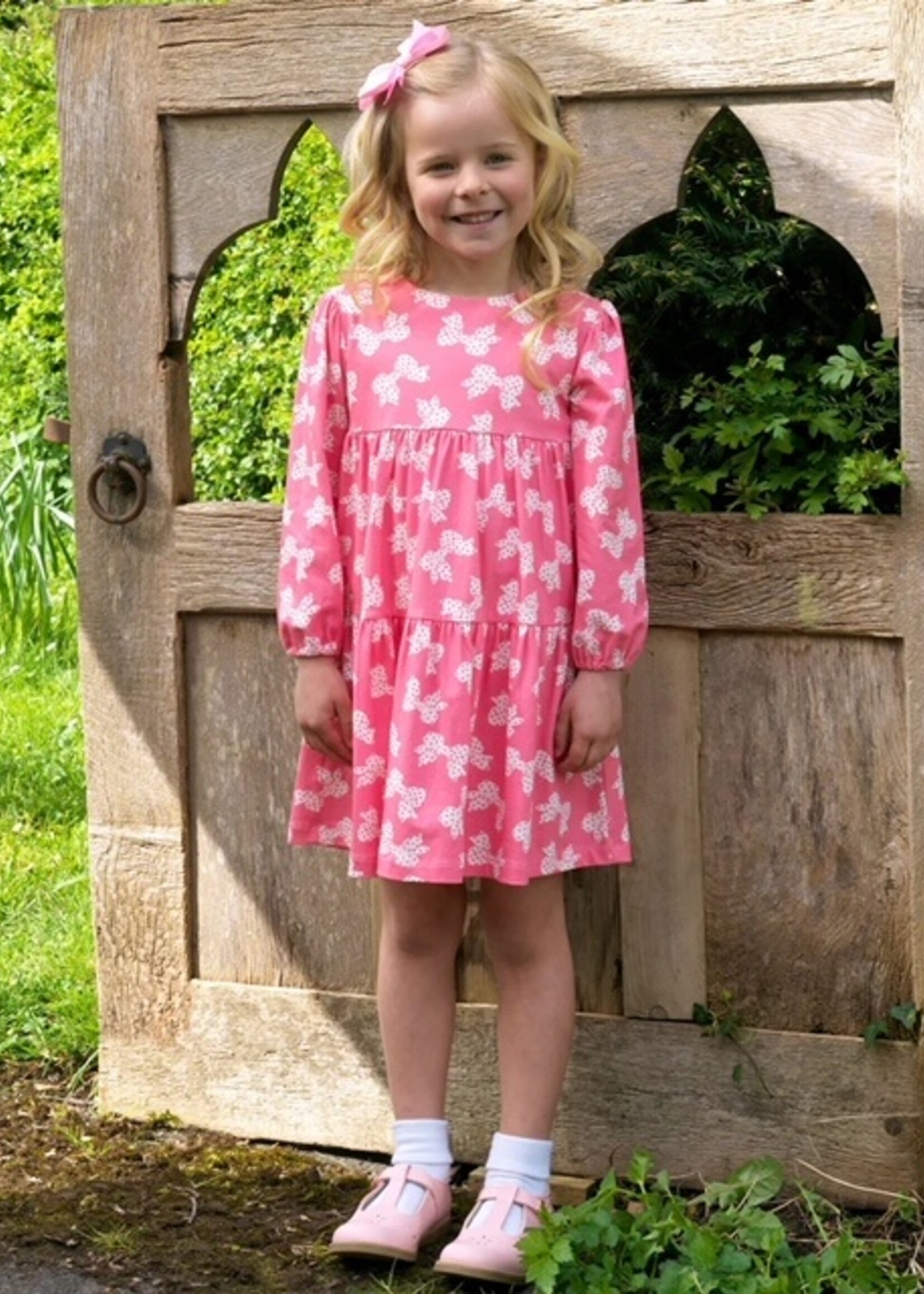 PINK POLKA BOW TIERED JERSEY DRESS