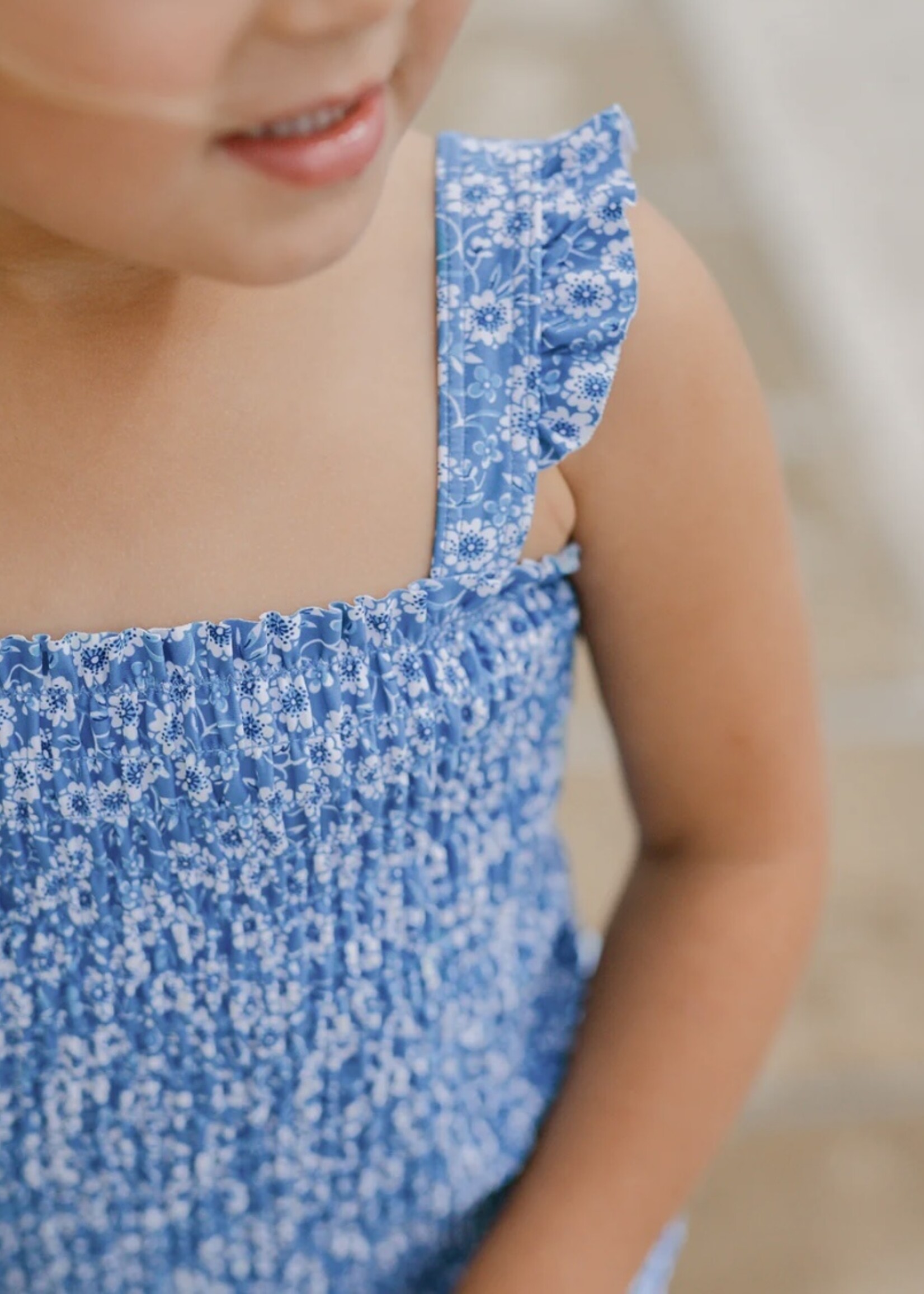 BLUE FLORAL SMOCKED ONE PIECE