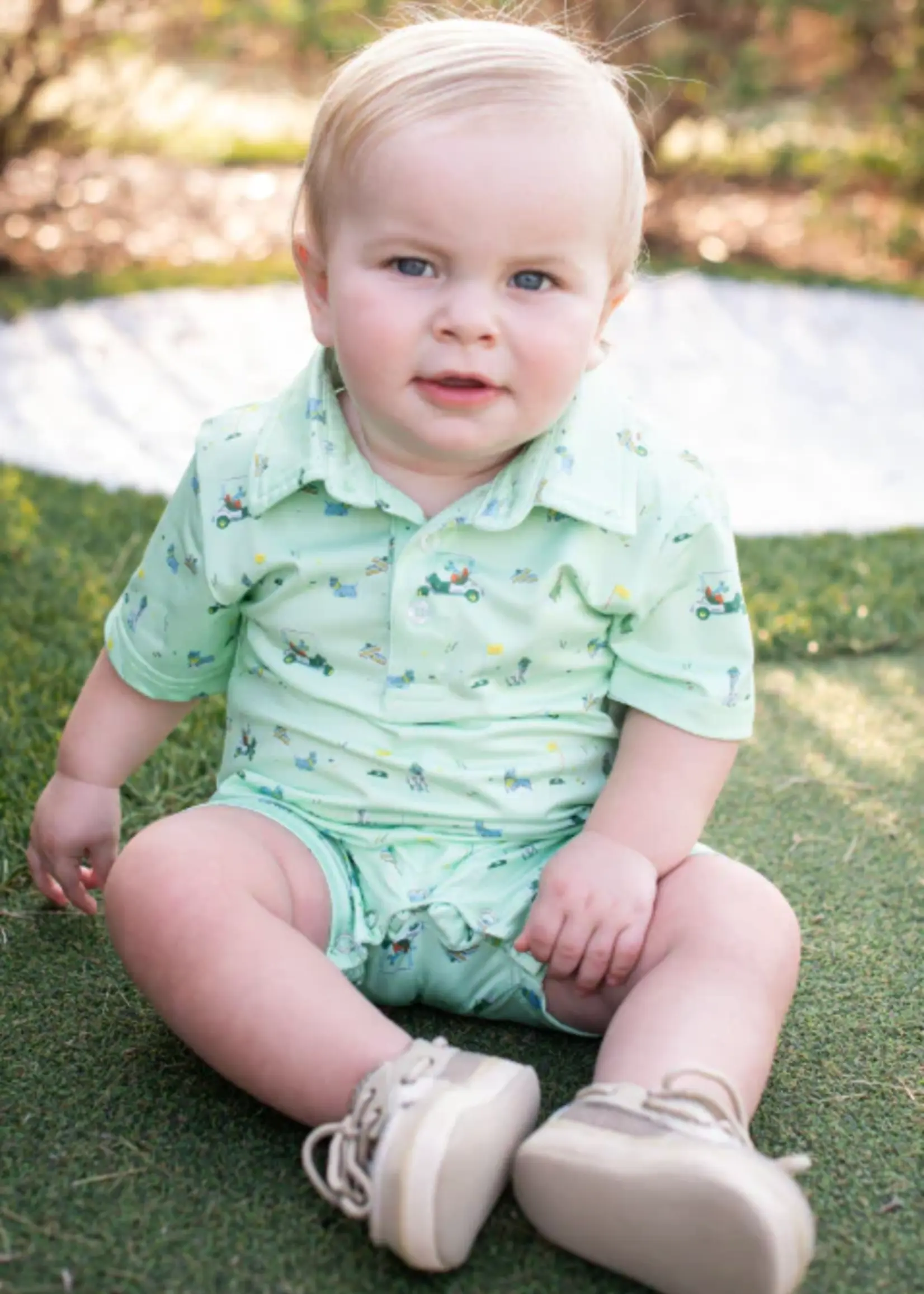 DOGWOOD PERFORMANCE POLO ROMPER