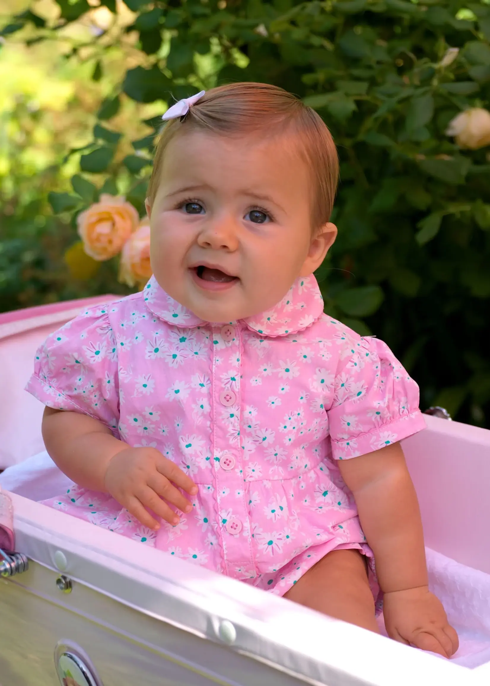 PINK DAISY BUTTON-FRONT BABYSUIT