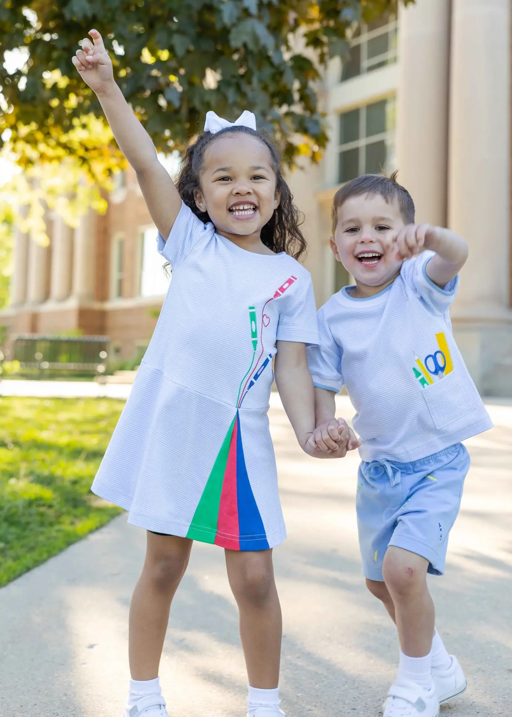 STRIPE KNIT DRESS WITH APPLIQUE CRAYONS