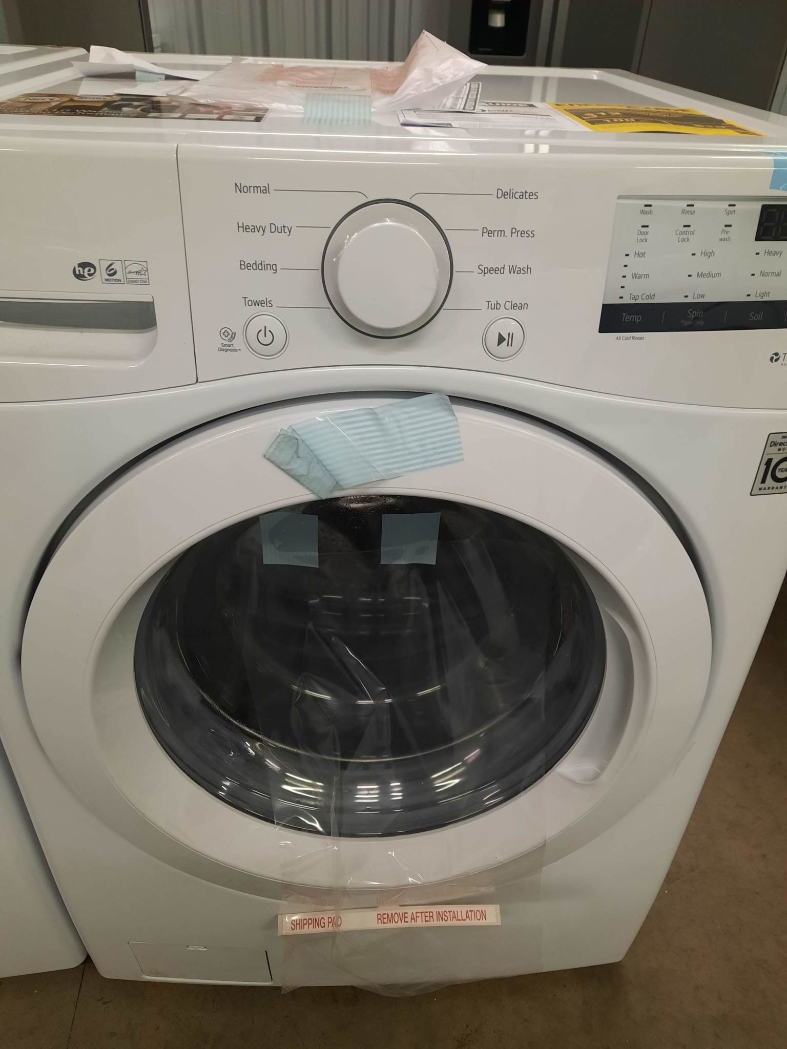 LG LG WM3400CW &  WD7100CW  4.5 cu. ft. Ultra Large Capacity White Front Load Washing Machine with Coldwash Technology  and 27" SideKick 1.0 Cu. Ft. 6-Cycle High-Efficiency Pedestal Washer - White