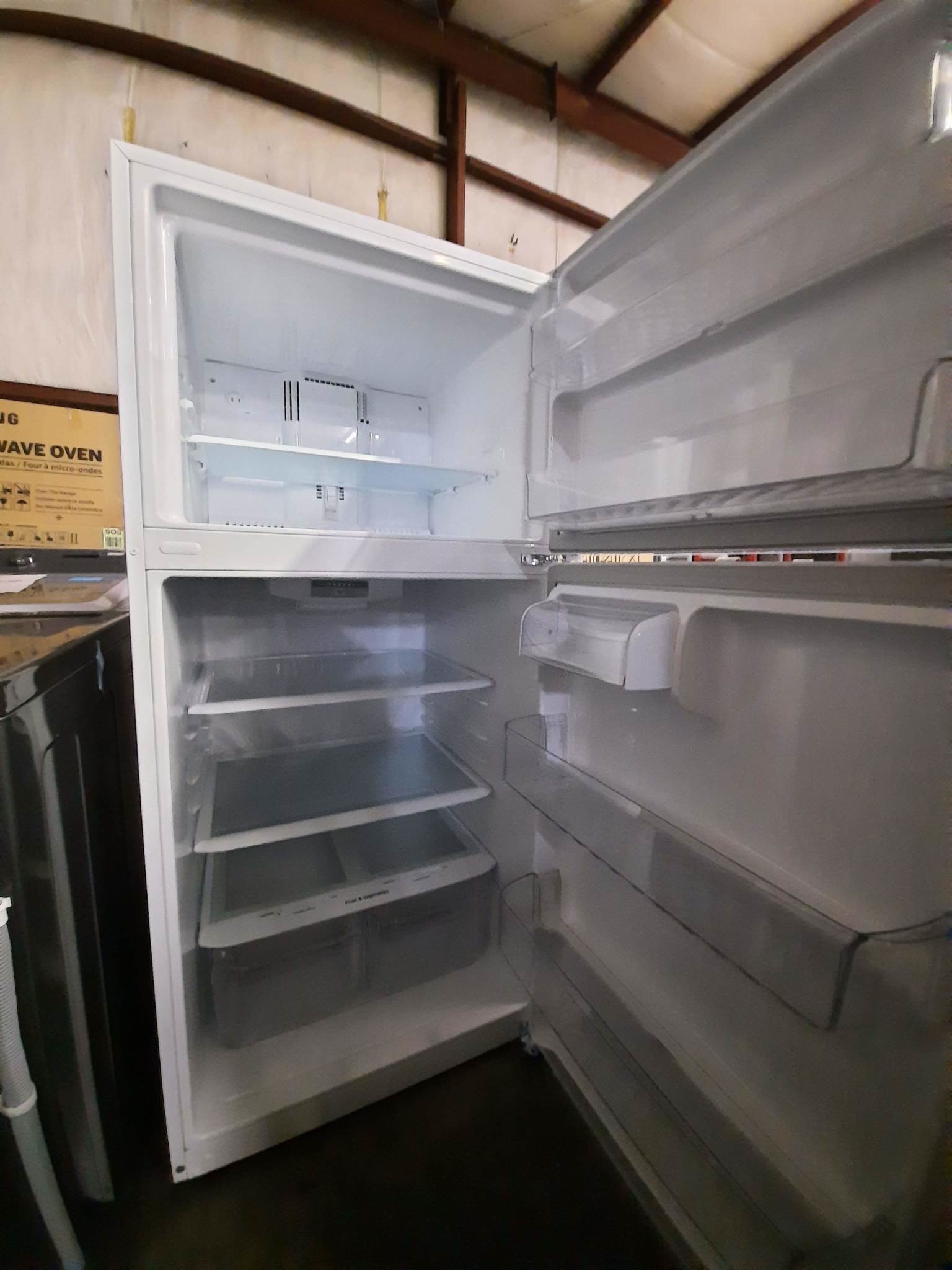 LG *LTCS20020W  30 in. 20 cu ft. Top Freezer Refrigerator in White with Reversible Door