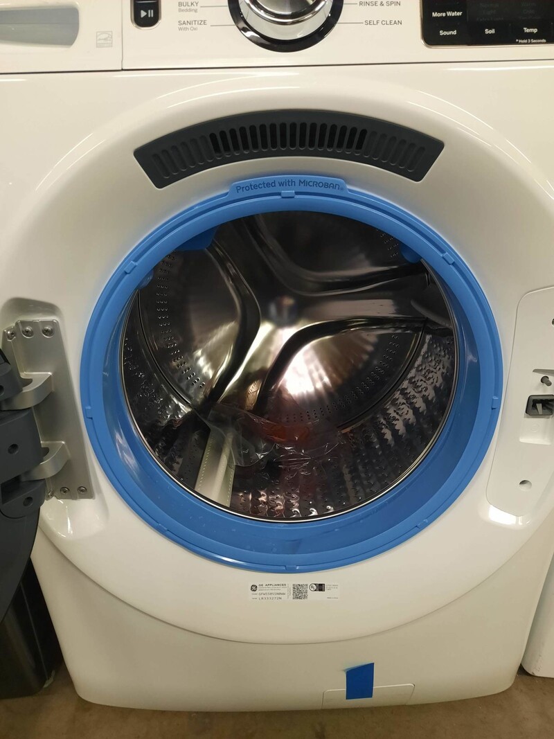 GE *GFW550SSNWW 32 in 4.8 cu. ft. White Front Load Washing Machine with OdorBlock UltraFresh Vent System and Sanitize with Oxi
