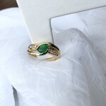 Franklin Jewelers 14kt Y half channel pear shape emerald and diamond ring