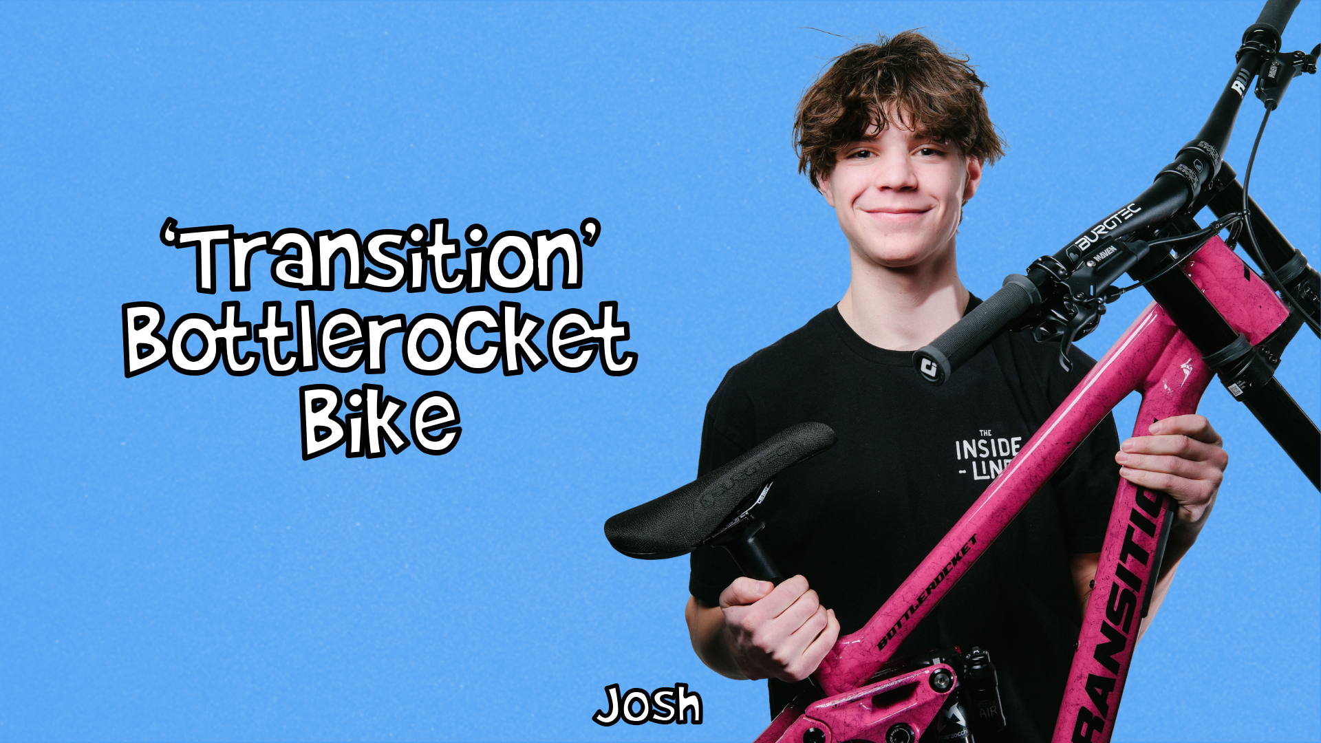 Josh holding a Transition Bottlerocket bike