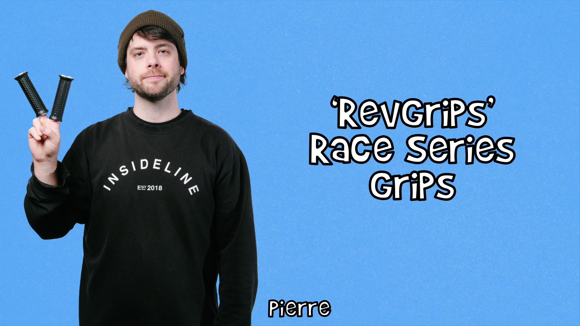 Pierre making the peace sign with RevGrips on his fingers