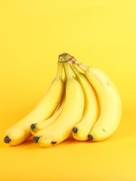 Bananes biologiques - une main