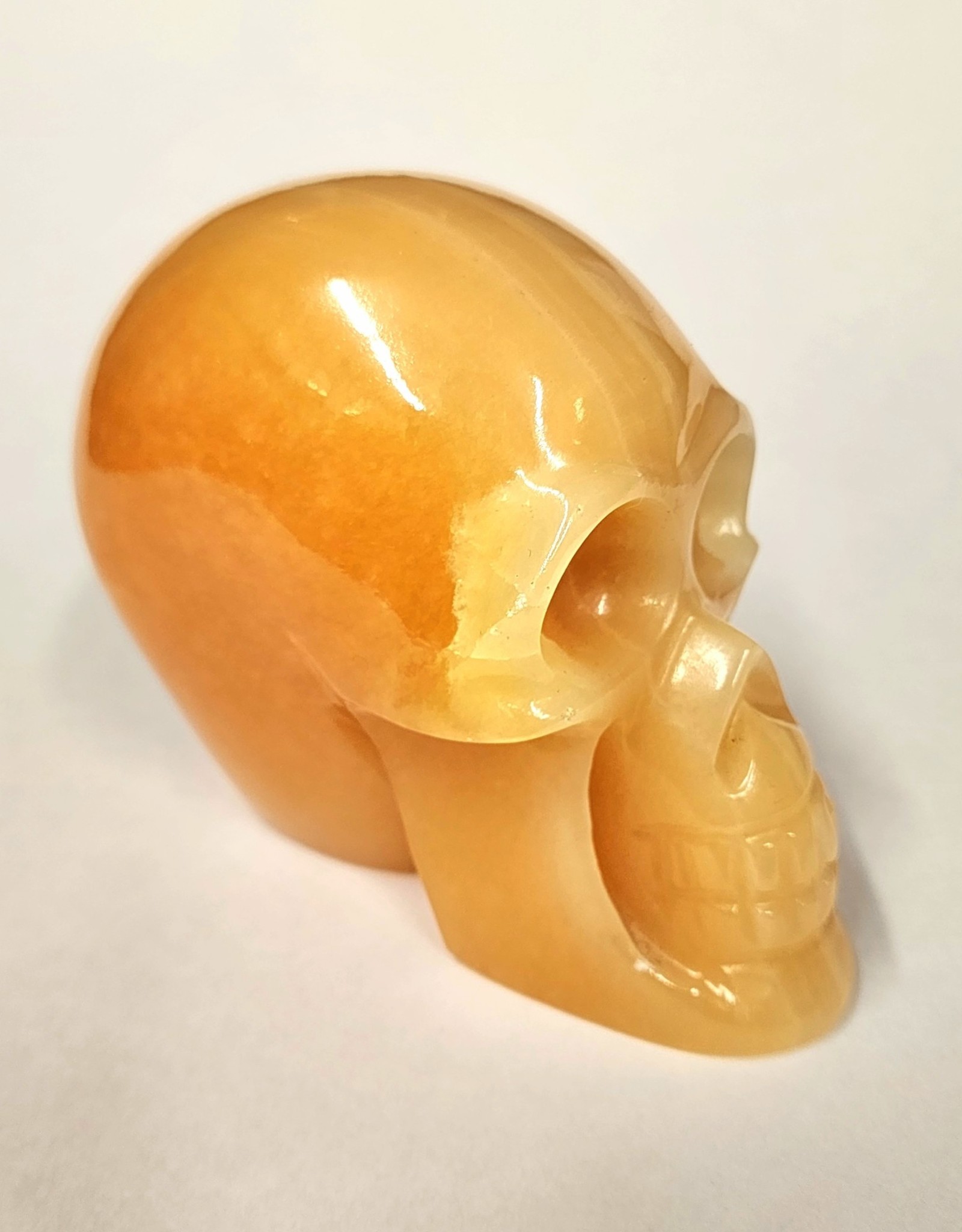 Orange Calcite Skull 6in