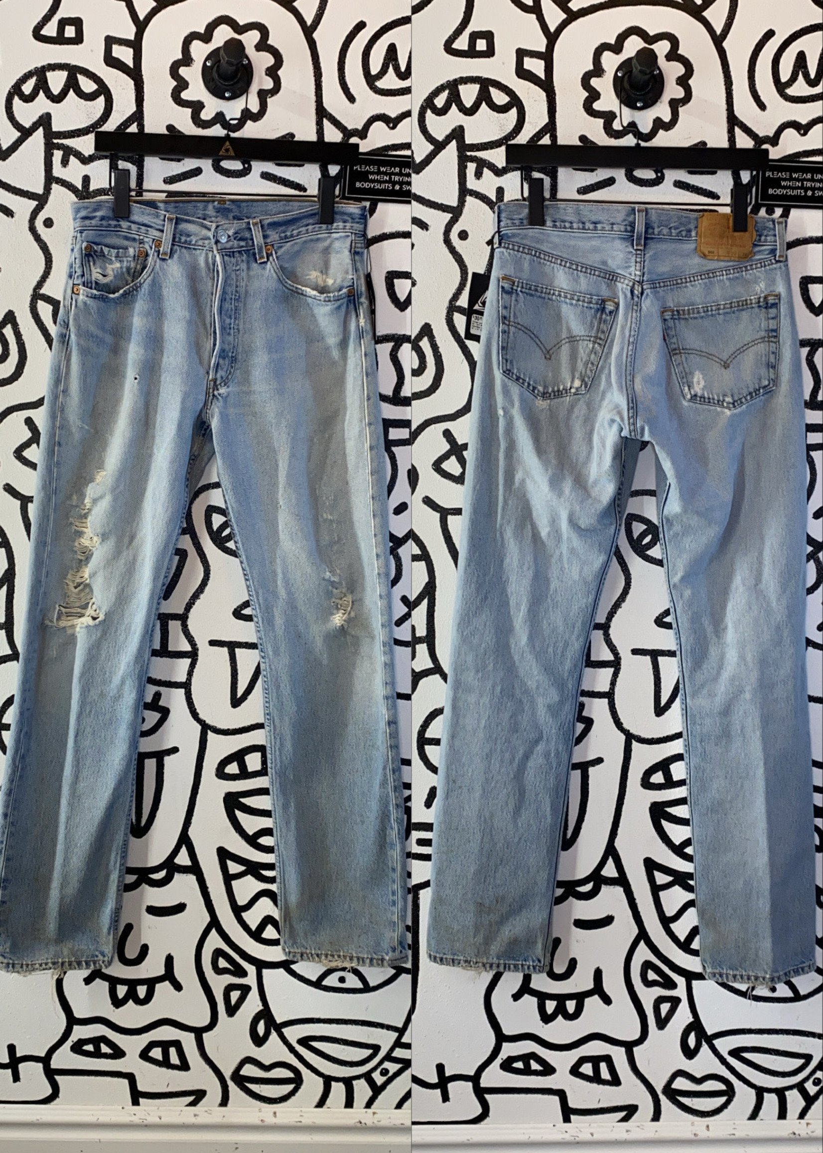 Vintage Levi's 501 Light Wash Distressed Jeans 32" x 34"